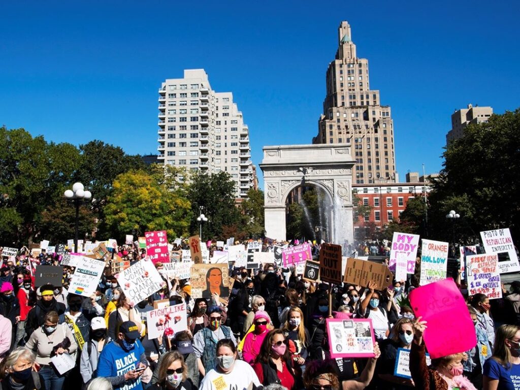 Activists take part in the 2020 Women's March in New York City — one of the hund...